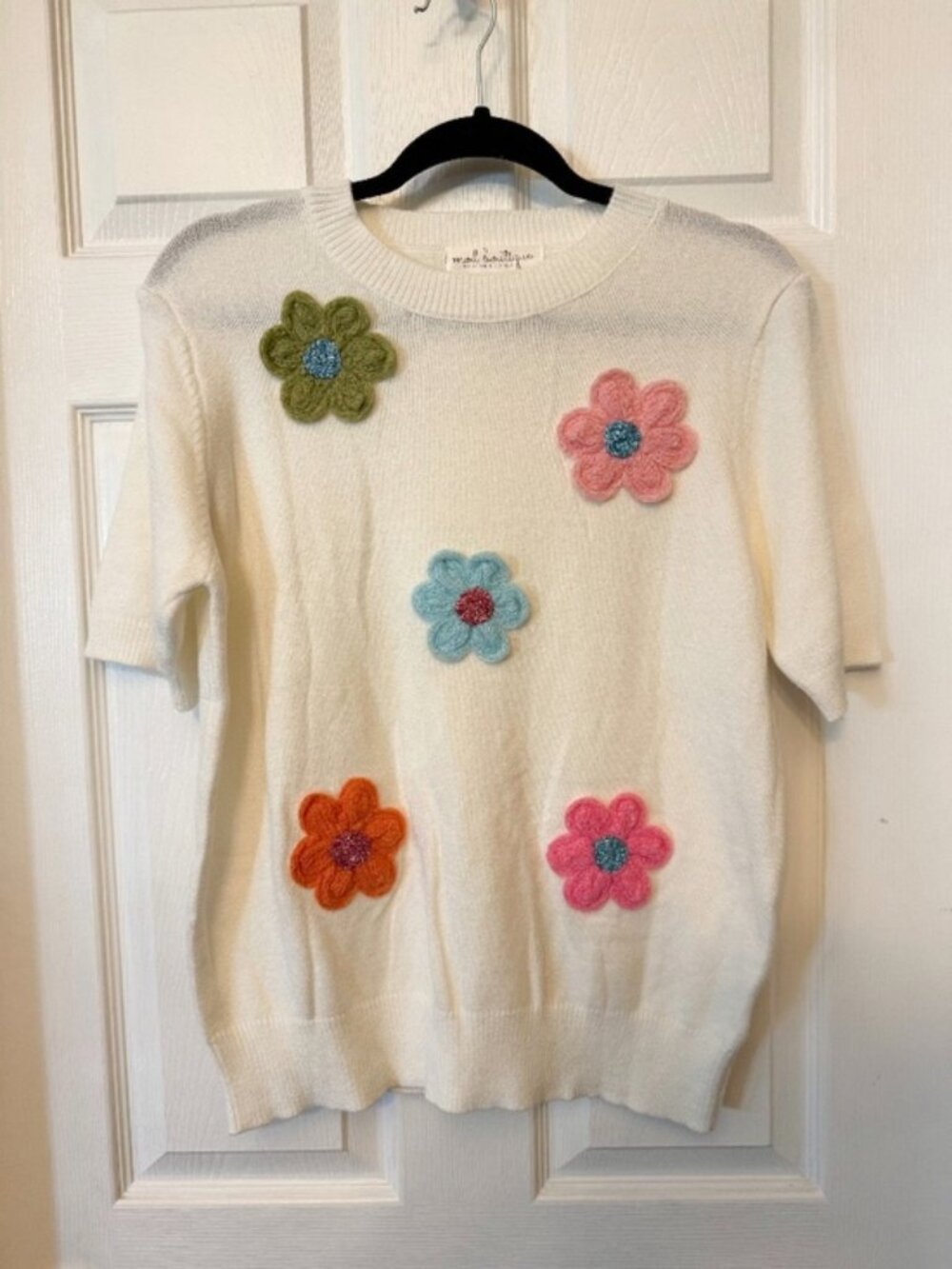 Cute spring floral sweater by Mod Boutique
